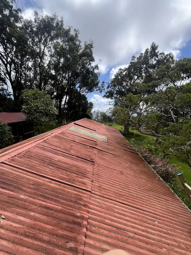 Day one: the old faded metal roof before work began