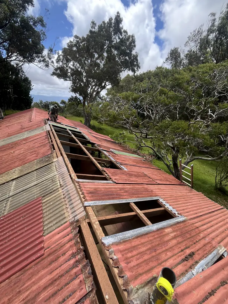 Old panels coming off, one section at a time